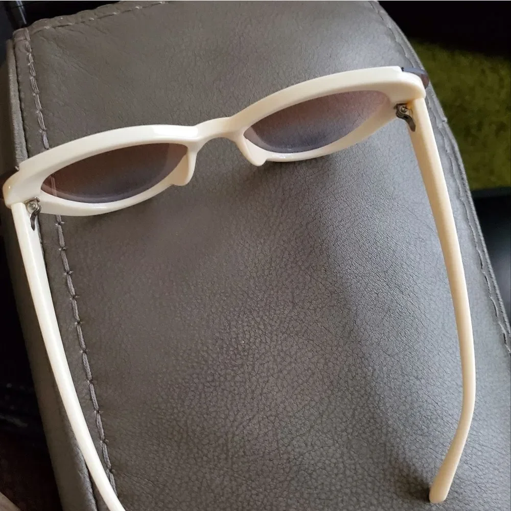 Small adult or child Beige sun glasses. New and never worn